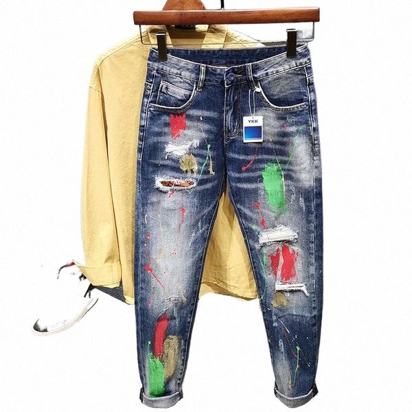 Jeans da uomo Graffiti Fi Vernice spray Strappato Foro Persality Hip-hop Streetwear Abbigliamento maschile Pantaloni slim in denim da gioventù