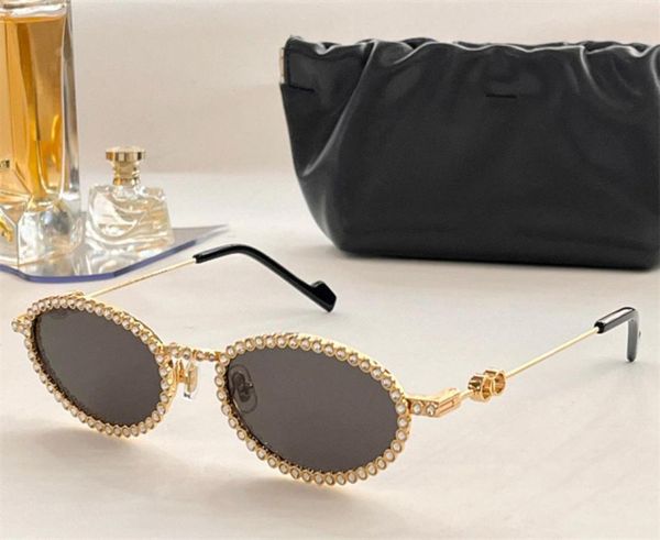 Stilista Lesyeux occhiali da sole da donna con montatura d'avanguardia con diamanti di forma ovale in metallo occhiali da sole tendenza stella stesso stile Ant8871270