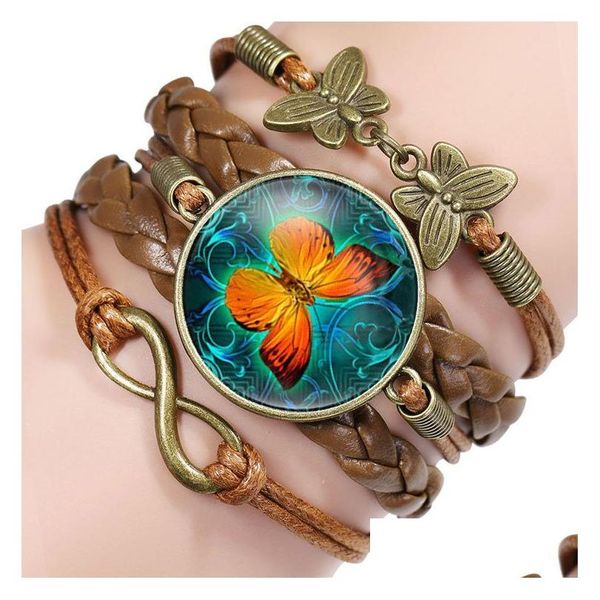 Braccialetti con ciondoli Vintage Farfalla in pelle per le donne Cabochon in vetro Tessitura animale Corda Bracciale avvolgente Gioielli di moda Regalo Consegna di goccia Dhlzn