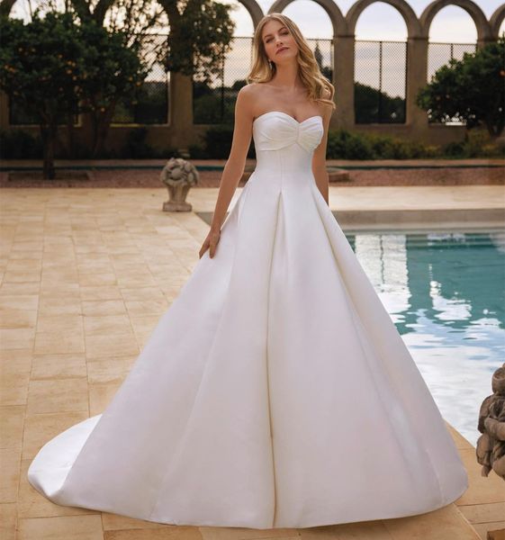 Abiti da sposa eleganti lunghi in raso con scollo a cuore con tasche/maniche rimovibili A-Line avorio Sweep Train Cerniera posteriore Abiti da sposa per le donne