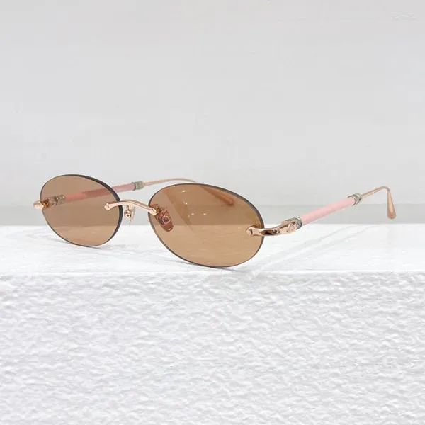 Óculos de sol 2024 Oval Rimless Cut Lens Pequenas Mulheres Homens Marca Designer Top Quality Metal Round Frame Pilis UV400 Óculos