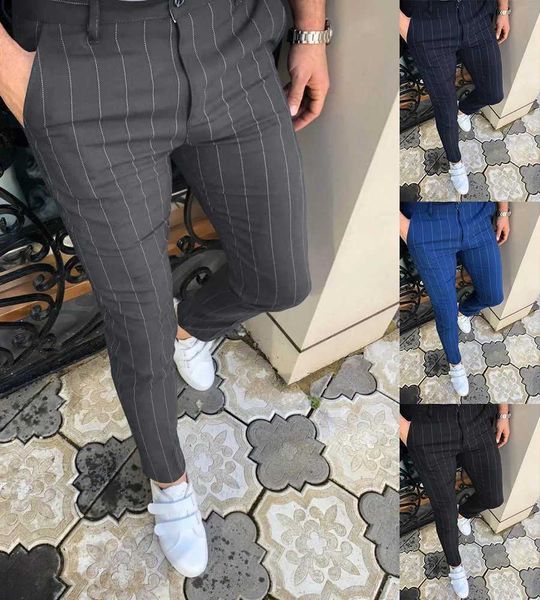 Pantaloni da uomo Nuovi 2023 pantaloni caldi da uomo strisce commerciali ultra-sottile primavera / estate vita pantaloni a matita gamba piccola moda di strada abbigliamento uomo J240328