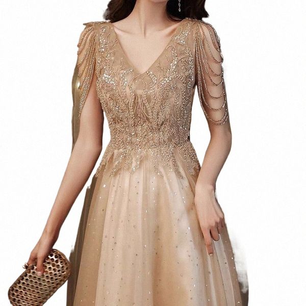 Champagne Gold Evening Dres com Cape A Linha Sexy V-Neck A Linha Brilhante Luxo Beading Shawl Formal Celebridade Prom Vestidos Novo W0yL #