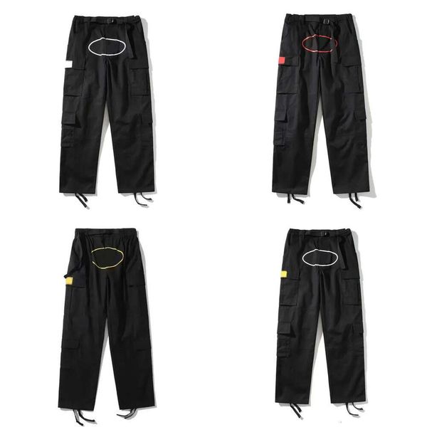 Pantaloni da uomo Cargo Streetwear Pantaloni casual stampati Hip Hop Pantaloni militari retrò multi-tasche Salopette dritta allentata con bottoni Coppia Stra