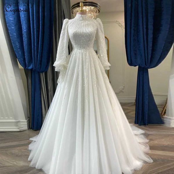 Abiti sexy urbani Ciynsia maniche lunghe di lusso da sposa musulmana in pizzo in rilievo Dubai abiti da sposa arabi per le donne Sposa Robe De Marie 2024 yq240329