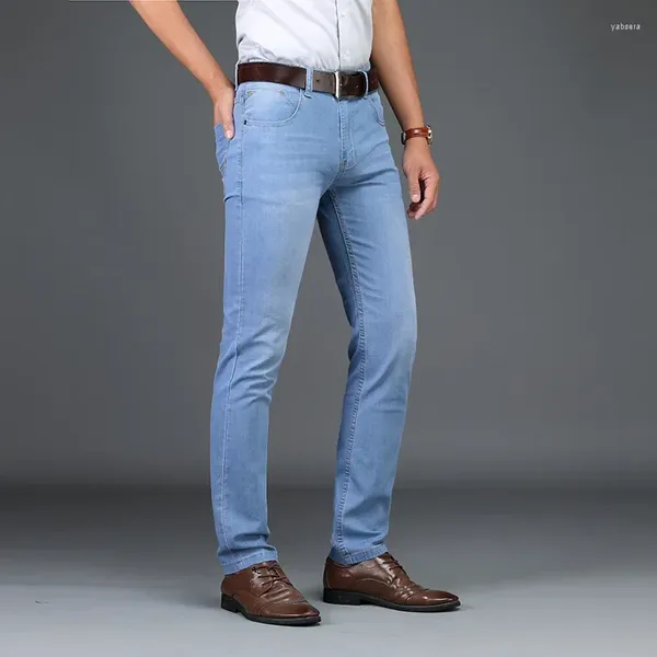 Jeans masculinos homens magros 2024 moda masculina negócios estiramento denim calças casuais luz azul vintage vestido calça primavera verão