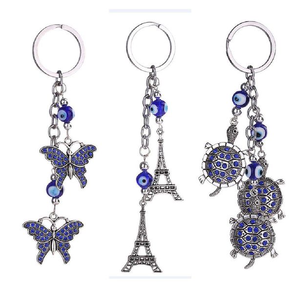 Schlüsselanhänger Blue Evil Eye Schlüsselanhänger Ring Schmuck Schildkröte Eiffelturm Schlüsselanhänger Mode Tiere Schmetterling Charms Kettenhalter für Handtaschen Dhhun