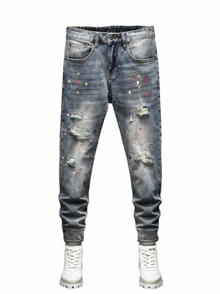 Jeans skinny da uomo vintage stile coreano cargo con fori strappati e schizzi di vernice Cowboy Hip Hop Streetwear Pantaloni in denim Uomo 93Sf #