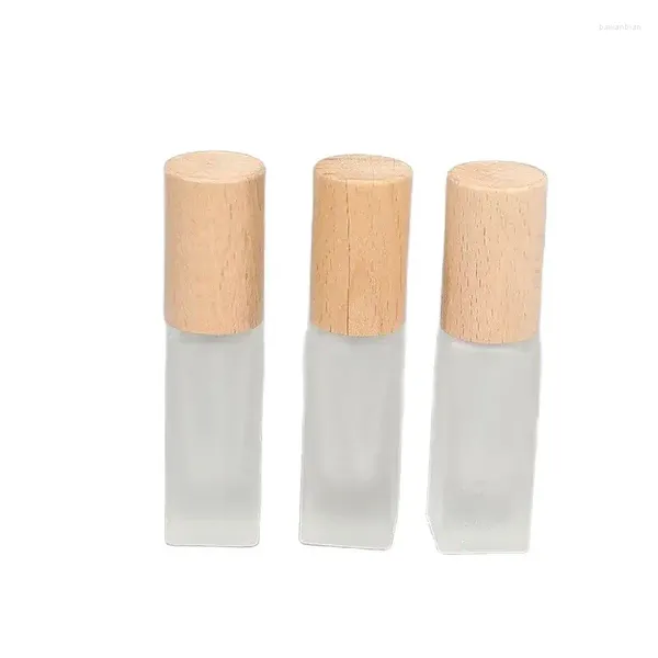 Aufbewahrungsflaschen 25 Stück 6 ml Mini-Parfümflasche, nachfüllbar, Milchglas, quadratischer Holzdeckel, Kosmetikverpackungsbehälter, Zerstäuber, Sprühnebel