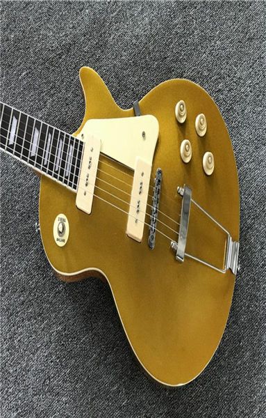 1956 Gold Top Goldtop Электрогитара с оберткой вокруг хвостовой части Белые звукосниматели P90 Китай OEM Музыкальный инструмент1427425