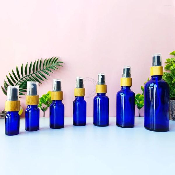 Bottiglie di stoccaggio 10 Pz/lotto 5/10/15/30/50/100ml Vuota Riutilizzabile Blu Verde Profumi di Vetro Bottiglia Spray coperchio di bambù Naturale Liqud Campione