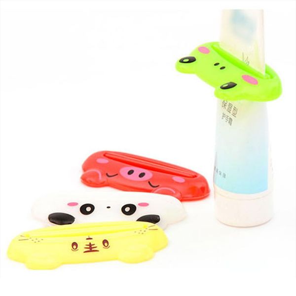 1pcs de creme dental útil suporte para o banheiro em casa animal fácil dispensador de dente dispensador plástico pasta de dente squeezer