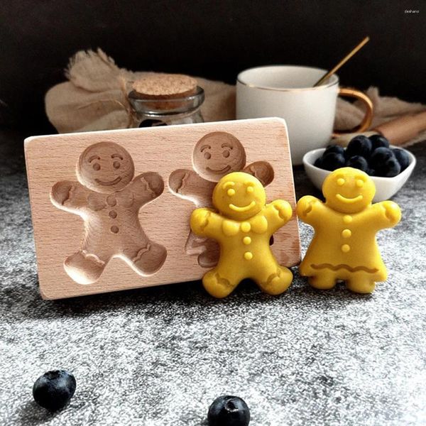 Stampi da forno Stampi per biscotti in legno con modello di omino di pan di zenzero natalizio Taglierina in rilievo intagliata 3D per utensili da cucina