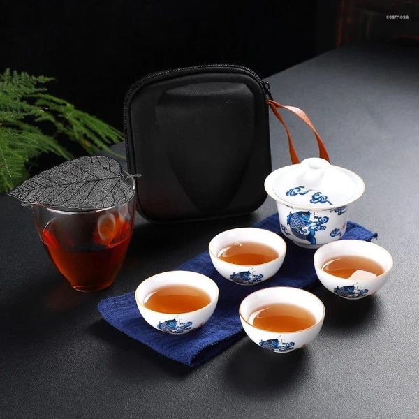 Set da tè Set da teiera cinese Portatile in ceramica Una pentola Quattro tazze da viaggio all'aperto Cerimonia Gaiwan Tazza da tè Regalo per amico