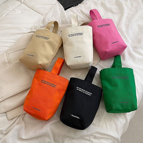 Minimalist stil mini tuval çanta tutamaçlı portatif öğle yemeği çantası şekerlik renkli su ısıtıcısı bilek kayışı düz el çantaları mektup alışveriş çantaları yfa2193