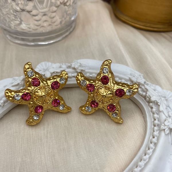 Retro Französisch Retro Ozean Reisen Frauen Ohrring Purpurrot rote Edelstein Seestarfish Gold Plated Ohrclip Schmuck E6580