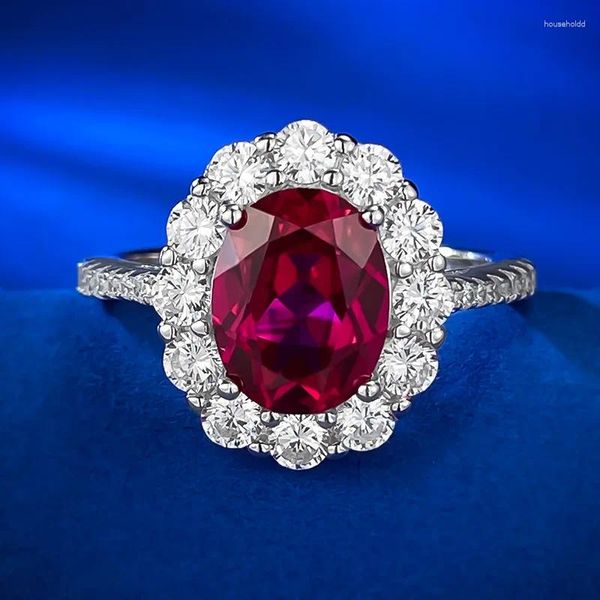 Clusterringe europäischer und amerikanischer klassischer Künstlungs -Taube Blut Red Oval 7 9 Zirkon Ring