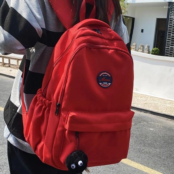 Sırt çantası 2024 unisex büyük kapasiteli öğrenci Korean düz renkli erkek kızlar kitap paketi naylon su geçirmez seyahat çantası okul çantası