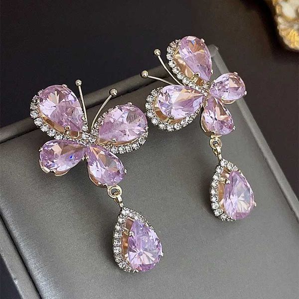 Dangle Kronleuchter eingelegter Strassfaller Schmetterling Wasser Tropfen Ohrringe für Frauen rosa Märchen -Ohrringe Einfaches vielseitiges Glanz Schmuck Geschenk