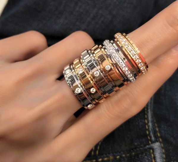 Дизайнерские обручальные кольца мужчины женское кольцо полное бриллиант Семь бриллиантов, чтобы повернуть кольцо мужчины и женщины, покрытые 18 -километровым розовым золотом резное качественное качественное кольцо