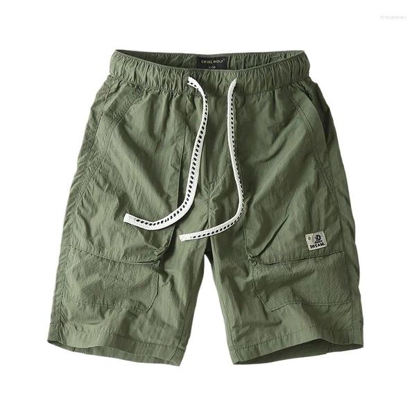 Shorts masculinos 2024 roupas de trabalho de verão finas vestindo cintura elástica da moda versátil, calça casual split versátil