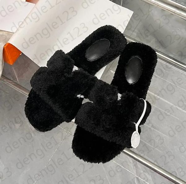 Дизайнерские тапочки Hemes Ladies Wool Slides Зимние роскошные пушистые пушистые пушистые теплые буквы Сандалии Удобные пушистые перевернутые треугольные железные листы Girl Flop Give Give