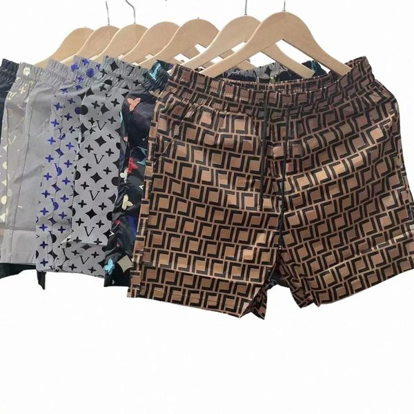 Shorts shorts masculinos de fashion de praia de fashion masculino quadro de ginástica curta malha esportiva de ginástica esportivo