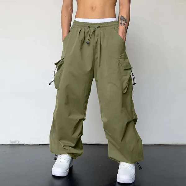 Herrenhose Streetwear 2024 Frühling Sommer HAREM CLASSIGE MEN ELASTIGE TAILE SOLLTE LARGO Multi -Taschenlose Baggy für Frauen