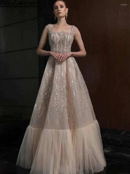 Partykleider Champagner Square Kragen Perlenkristall Dubai Prom A-Line ärmelloses abgestufte arabische formelle Kleider