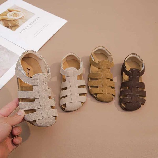 Sandali 2024 Summer New Boys Girls Girls intrecciato intrecciato versione coreana di bambini Roman Retro Shoes H240504