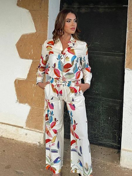 Pantaloni da donna a due pezzi chic floreali floreali lunghi set di pantaloni per donne camicie a manicotto in giro per le camicie dritte 2 pezzi 2024 Summer Lady Abito