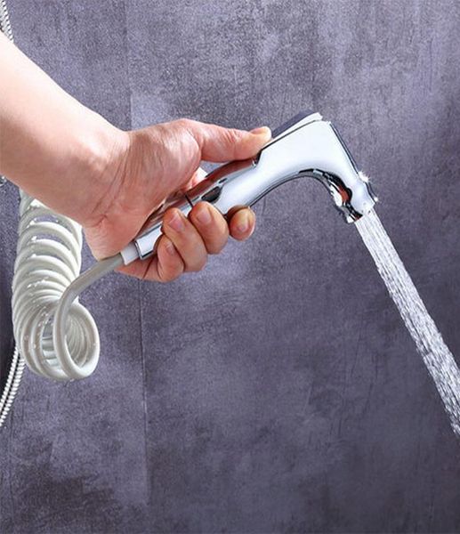 Torneiras portáteis higiênicas do chuveiro higiênico Torneiras portáteis do sprayer bidê de laço de bidê em casa retenções de spray bidê de vaso sanitário TAP1633173