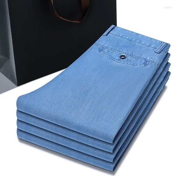 Jeans masculinos 2024 Primavera Verão Summer Fino azul claro Business Fashion Moda Lyocell Fabric Tream Denim Troushers Calças de marca masculina