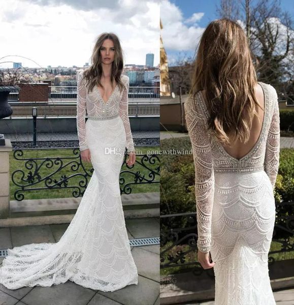 Abito da sposa in pizzo a sirena a maniche lunghe perle da sposa perle perle perle perle a pezzi di spicco di spicco.