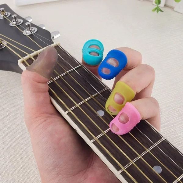 4pcs/conjunto de dedo thimbles manga luvas de silicone anti-escaldas tocando guitarra de guitarra Protection DIY Ganves de costura de costura guitarra