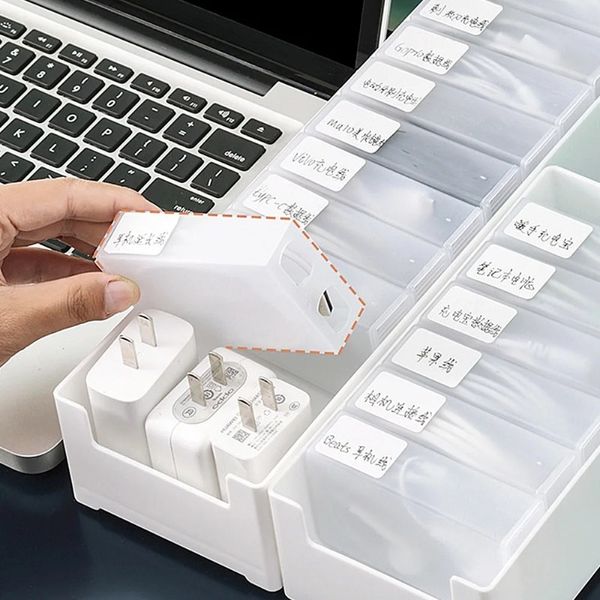 Casella di archiviazione dei cavi dati Il desktop Office può essere sovrapposto sugli accessori per strumenti di stoccaggio di cosmetici e articoli di stoccaggio dell'organizzatore