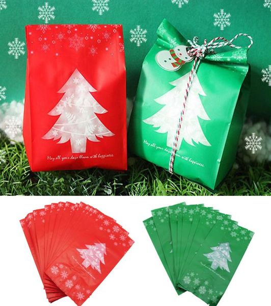 Weihnachtsgeschenktaschen Weihnachtsbaum -Plastikpacktasche Schneeflocken Weihnachtskasten Neujahr Kinderbevorzugt Tasche 20pcs2604269