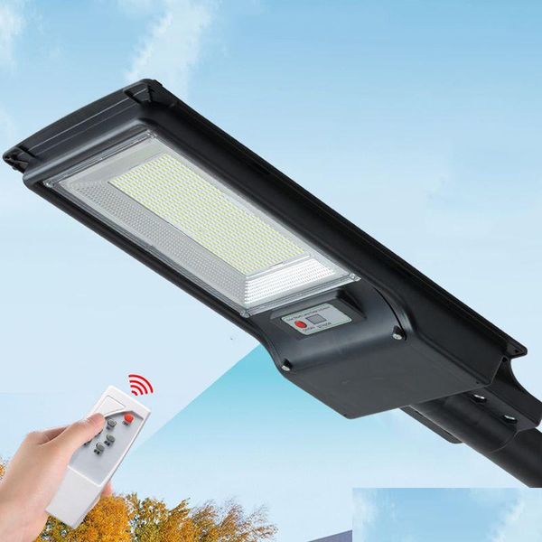 Solar Street Light 300W 600W Lâmpada de iluminação externa Sensor de radar com controle remoto de poste 492LED 966LED Drop Delivery Lights Renove Dh5pt