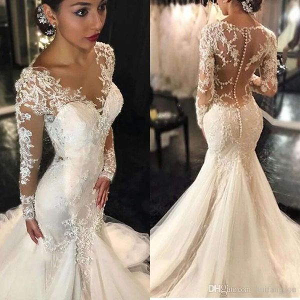 Lange 2021 mermiadärmelige Kleider Spitze Applikze sexy Illusion bedeckte Knöpfe Rückenschaufel Hals Strand Hochzeit Brautkleid Vestidos