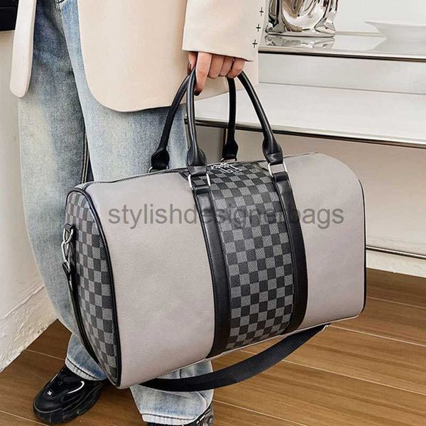 Duffel Bags Designers Moda Bolsas de Duffel Men de luxo Bolsas de viagem Feminino Bolsas de couro Holdall Carry On Bagage Overnight Weekender Bag 48/23