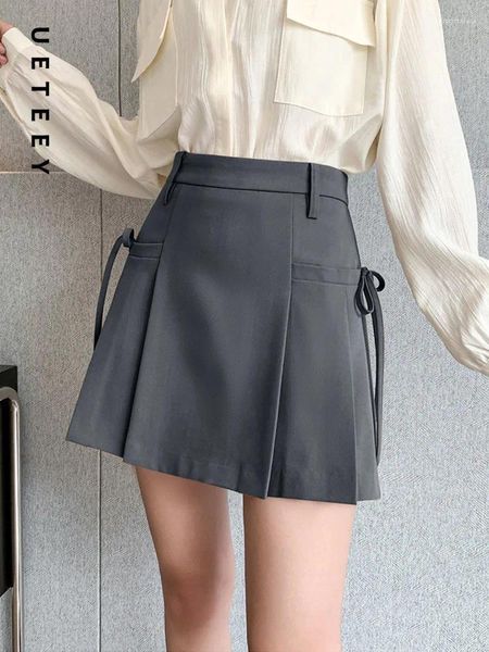 Юбки ueteey плиссированная юбка для женщин зашнуруется весной лето 2024 Корейская модная мода с высокой талией y2k шикарно -серые черные мини -мини -миниму