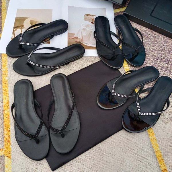 Designer de luxo Mulheres sandálias Joni Sandália plana de sandália e strass Mulher Flip Flop Sapas de praia Cool de praia 35-42