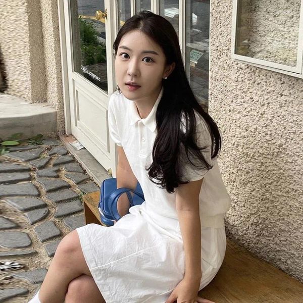 SKIRTS Korea Dongdaemun Summer Summer Feminino Polo lapela de lapela curta Sweater Salia branca meio bege sem mangas Spring Spring