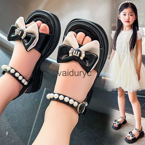 Sandalen Mädchen modisch 2024 Sommer New Childrens Bow Prinzessin kleine und mittelgroße Strandschuhe offene Frauen H240507