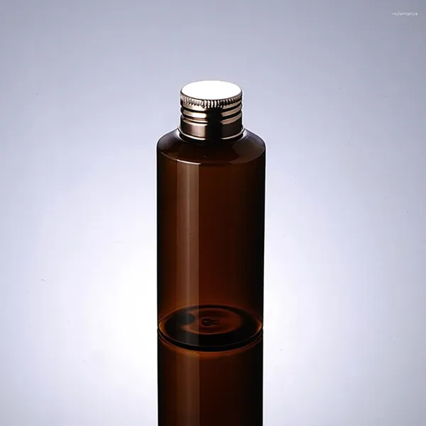 Bottiglie di stoccaggio rotonde rotonda ambra vuota imballaggio cosmetico per viaggi da viaggio bottiglia in oro e tappo in alluminio argento in plastica