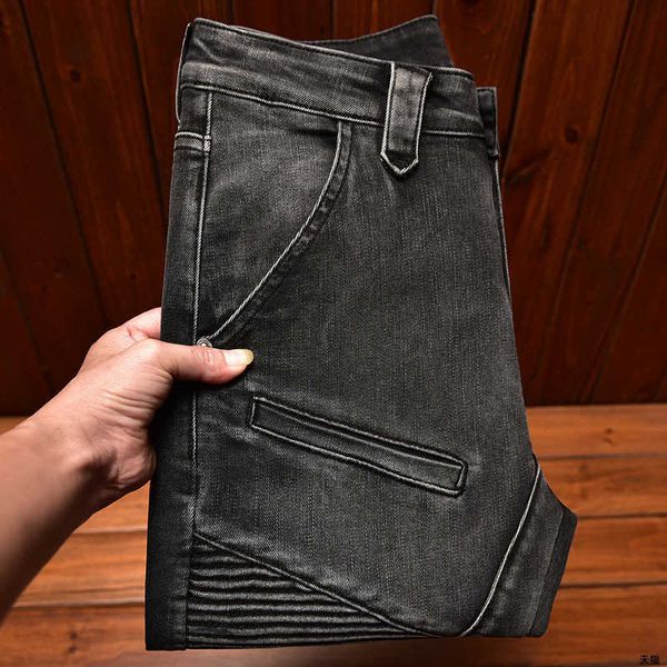 Jeans europeus de ponta Mens Slim Fit Leggings Leggings elásticos Marca moderna calças de motocicleta preta cinza da moda coreana