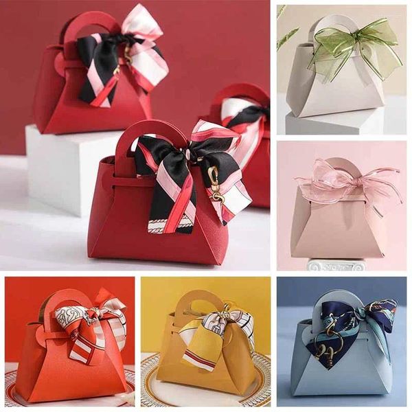 Geschenkverpackung Lederbeutel Bögen Ribbon Hochzeit bevorzugt Candy Box Mini Handtaschen Schokoladenverpackungstaschen Accessoires Partyzubehör