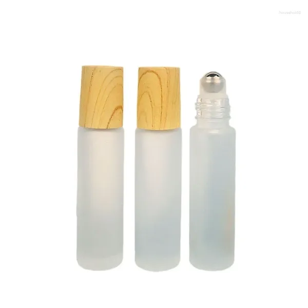 Lagerflaschen 25pcs 5ml 10 ml Mini Frostglas ätherische Öl Probe Refillabe Fläschchen Massage Stahl Roller Falschholz Deckel Parfüm Roll an
