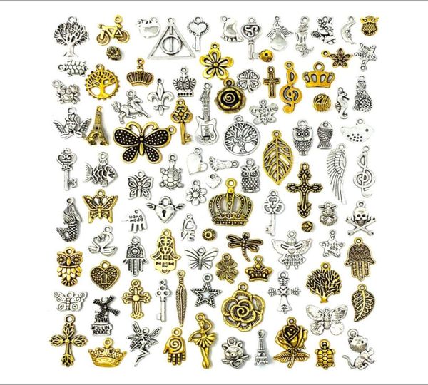 100pcs lotes de jóias integrais, fazendo com que os encantos misturados mistam silvergolden liga encantos de pingentes de diy para colar jewel8541105