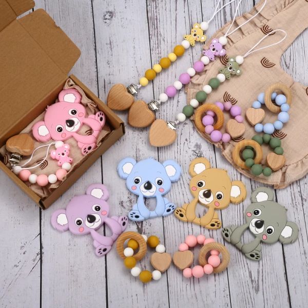 Blocchi 4pcs/set baby fumettoni animali da cartone animato giocattoli di cotone in cotone silicone a clip clip a clip bracciale in legno ad anello rotondo doni giocattoli a sonnelli